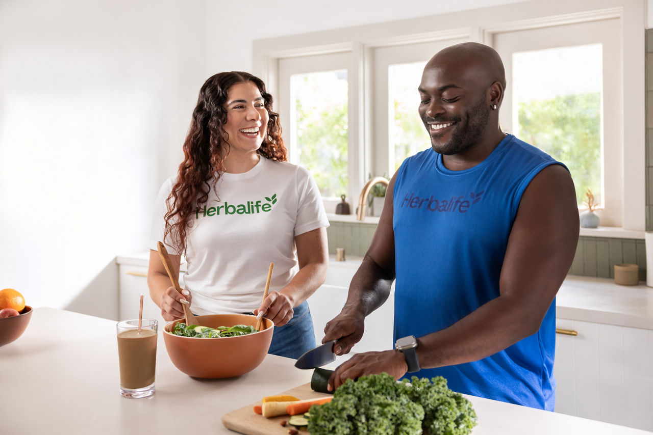 Couple making a salad