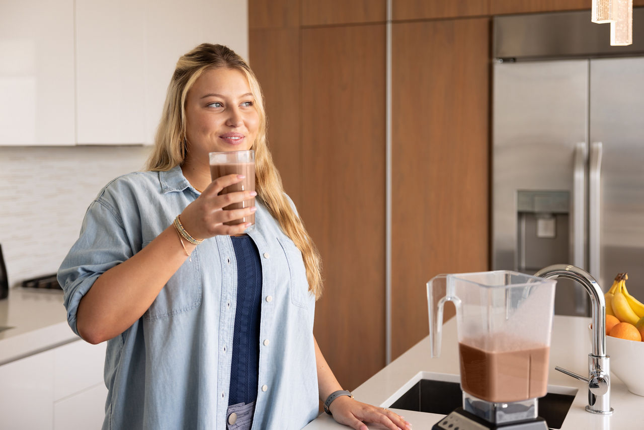 Woman enjoying an F1 Shake