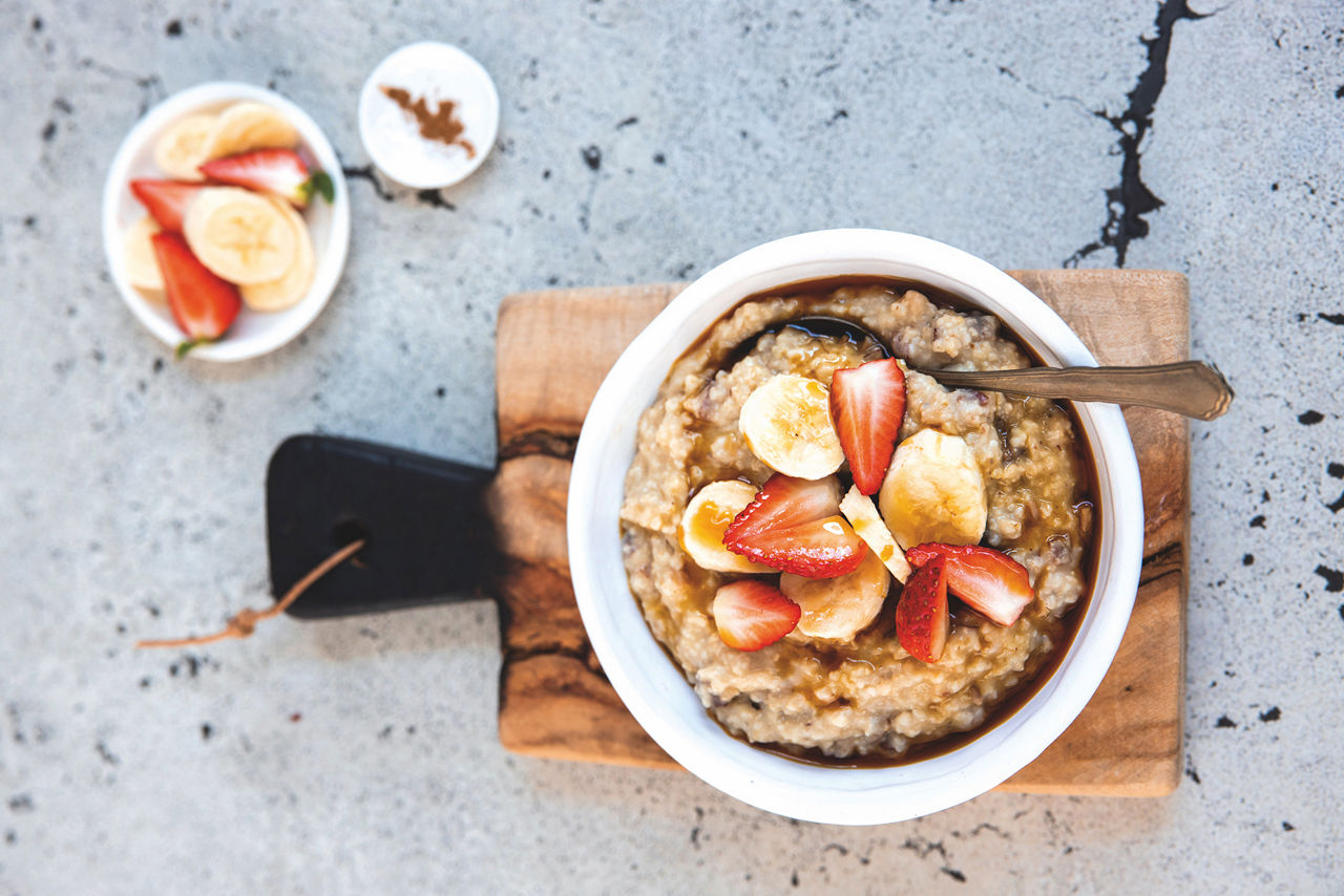 Bowl with dates and cinnamon porridge